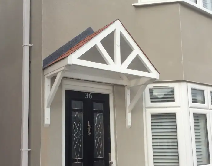 A pitched-roof door canopy